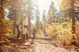 View of family hiking during a fall family getaway in Colorado