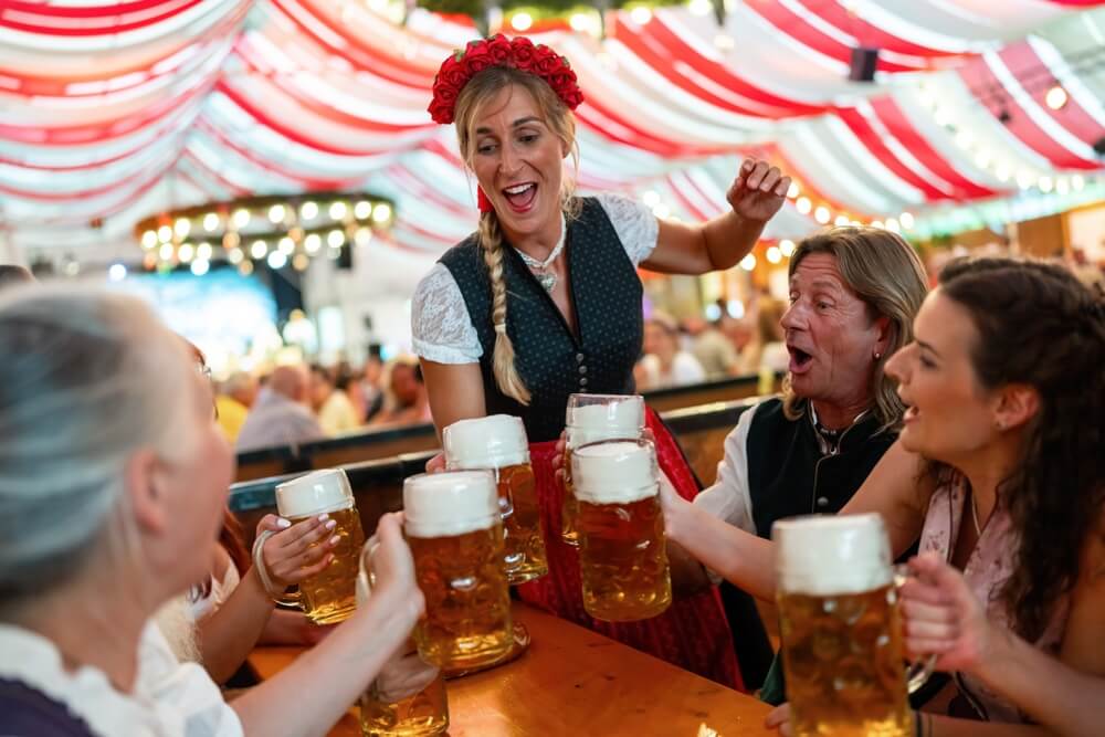 Person carrying beer at Oktoberfest fall festival in Vail Colorado