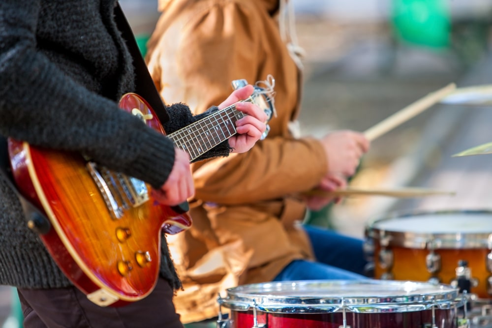 People playing instruments performing live music in Vail